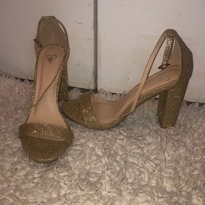 Gold high heels